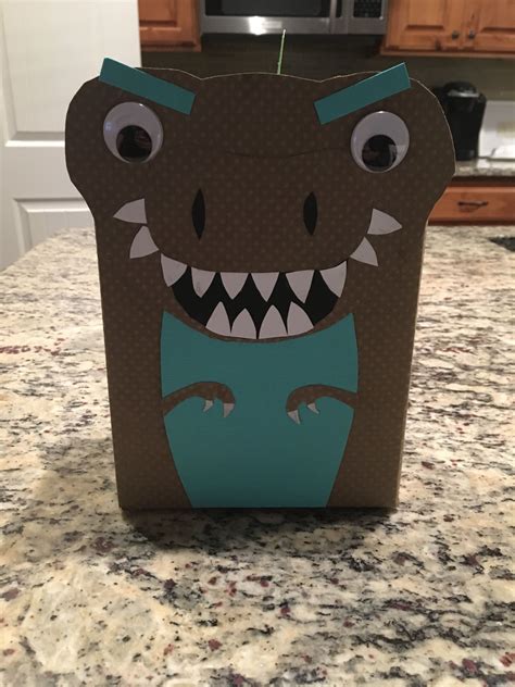 Dinosaur valentine box - Jan 27, 2019 · Place a small 2-inch piece of washi tape over the dinosaur and secure to the card. The nice thing about washi tape is that you can remove it from the card stock without it ruining the paper. Now, repeat until you have all your Valentine’s done! I’m in love with how these turned out! Super simple and inexpensive.